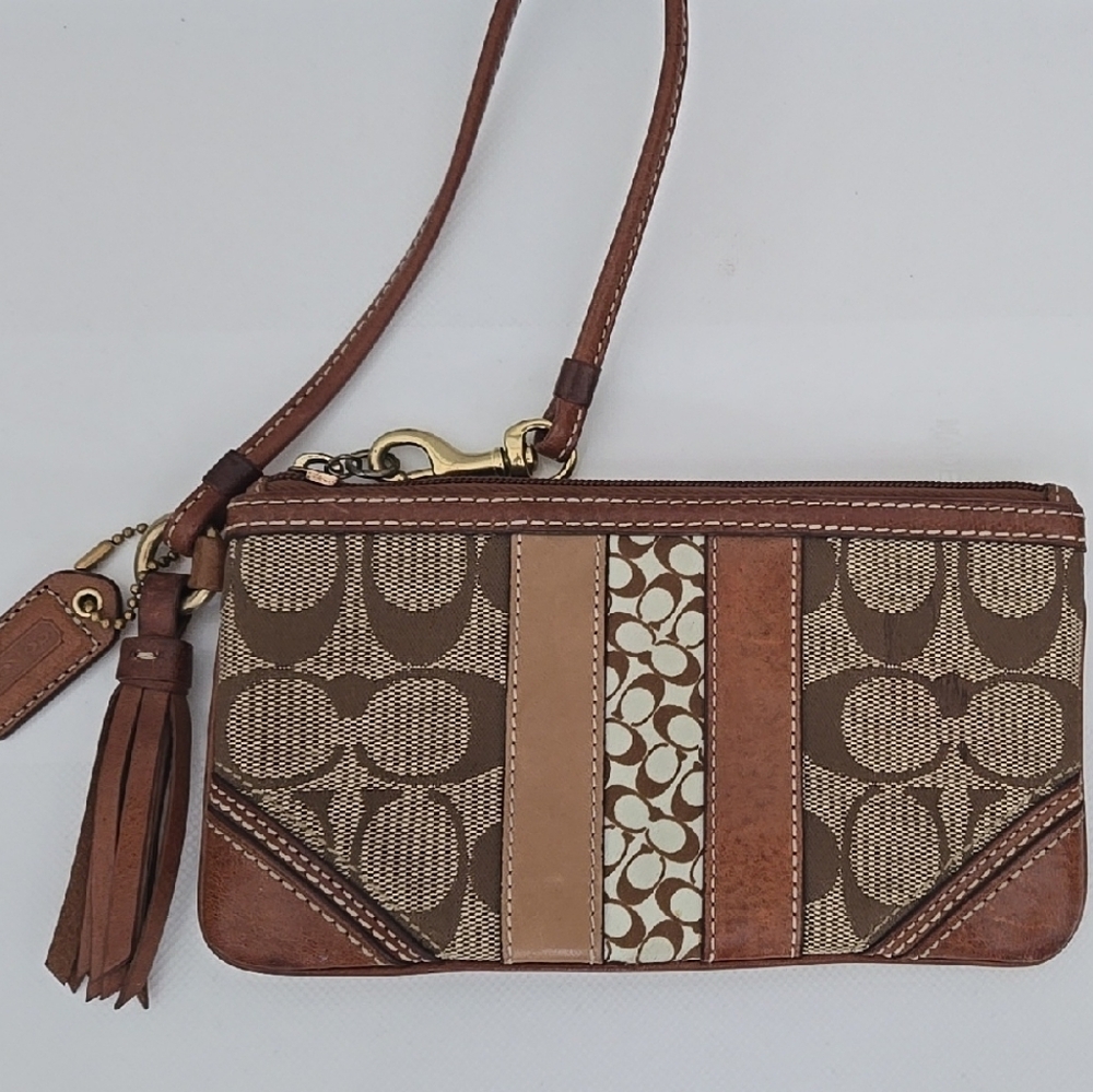 Coach Signature Brown Patterned Wristlet With Tassle
